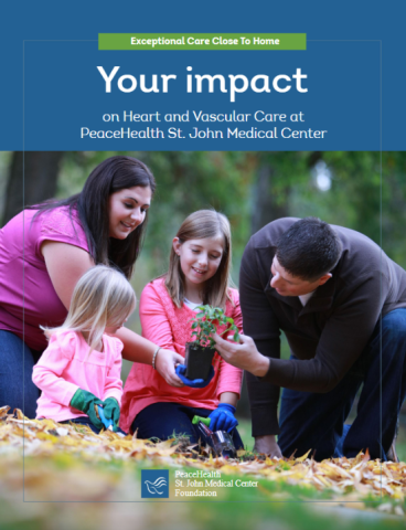 A happy couple plants flowers outside with their young children